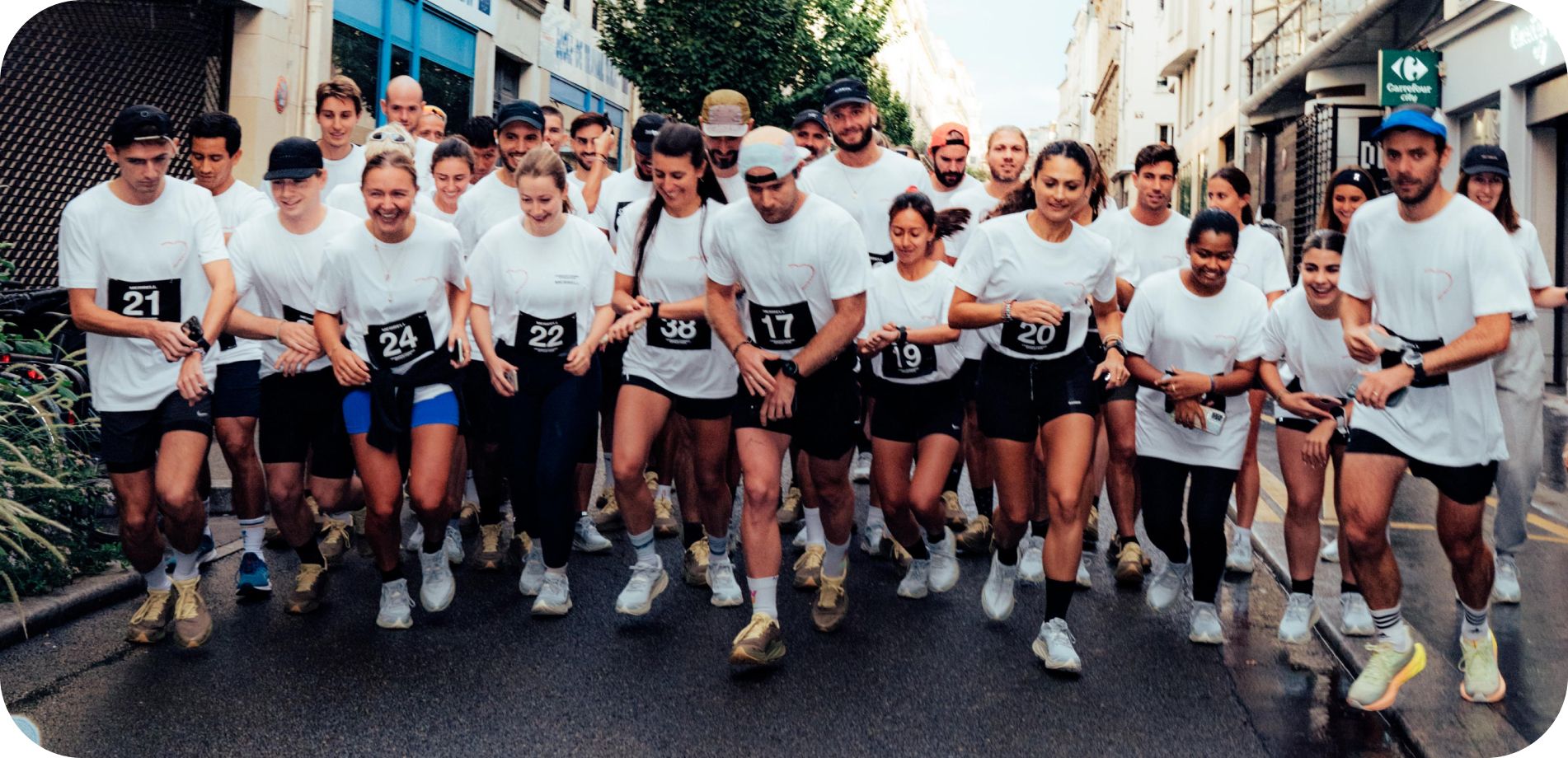 People running a race wearing Merrell ProMorph shoes